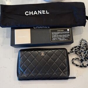 AUTHENTIC  Chanel Black Quilted Lambskin Zip Around Wallet LARGE SILVER HARDWARE